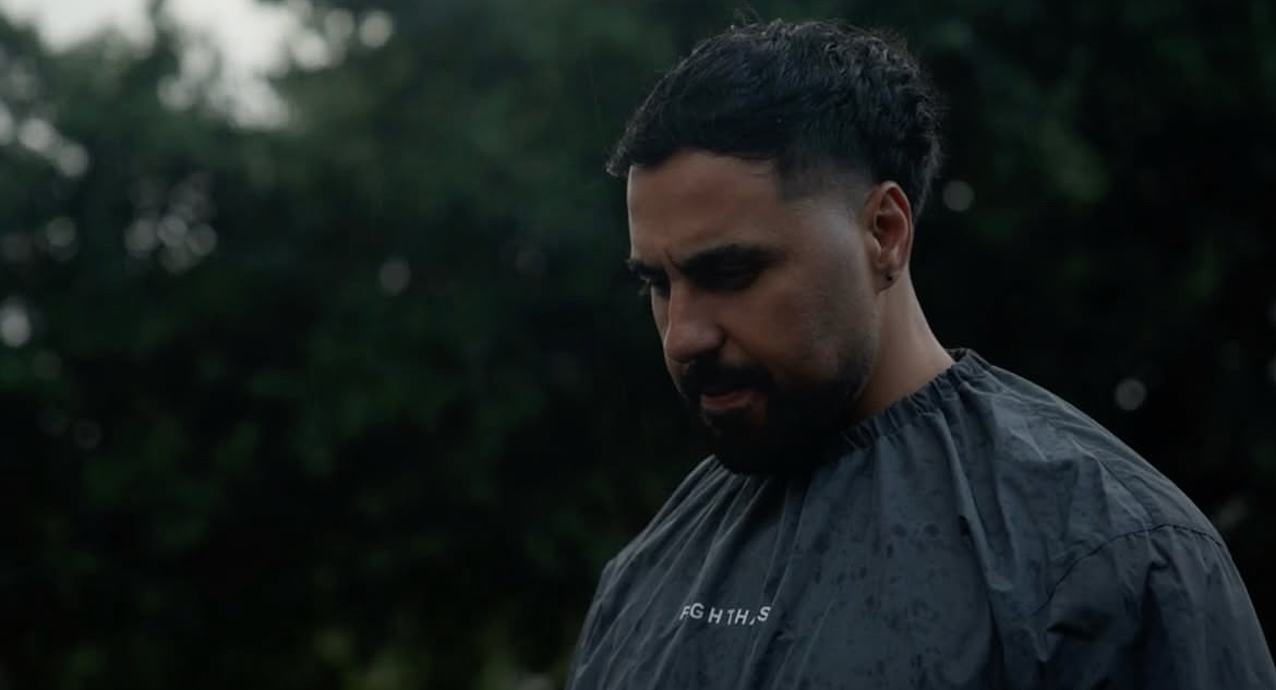 Angelo running in the rain